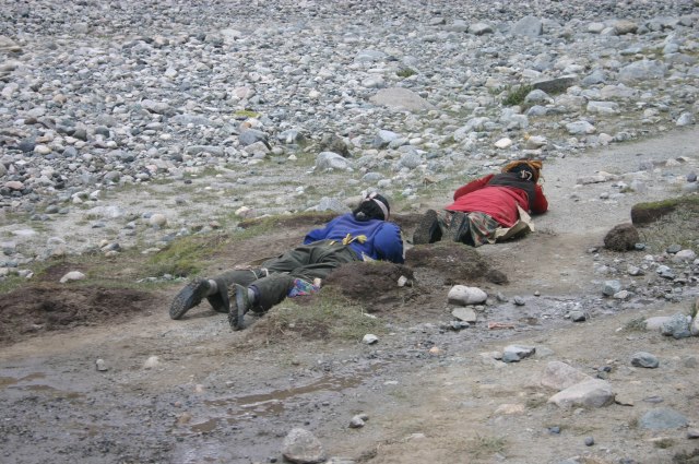 Mount Kailash Kora: Prostrating Pilgrims - © William Mackesy 2008