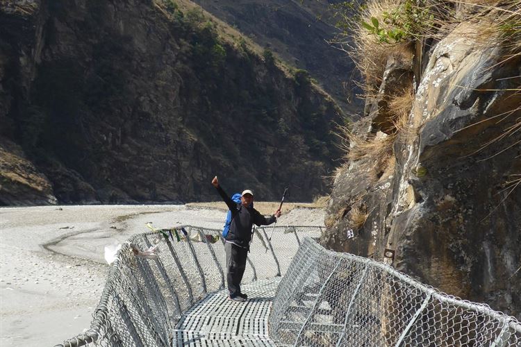 Nepal, Manaslu Circuit, Aital, my guide on pathway above Budhi Gandaki north of Yaruphant, Walkopedia