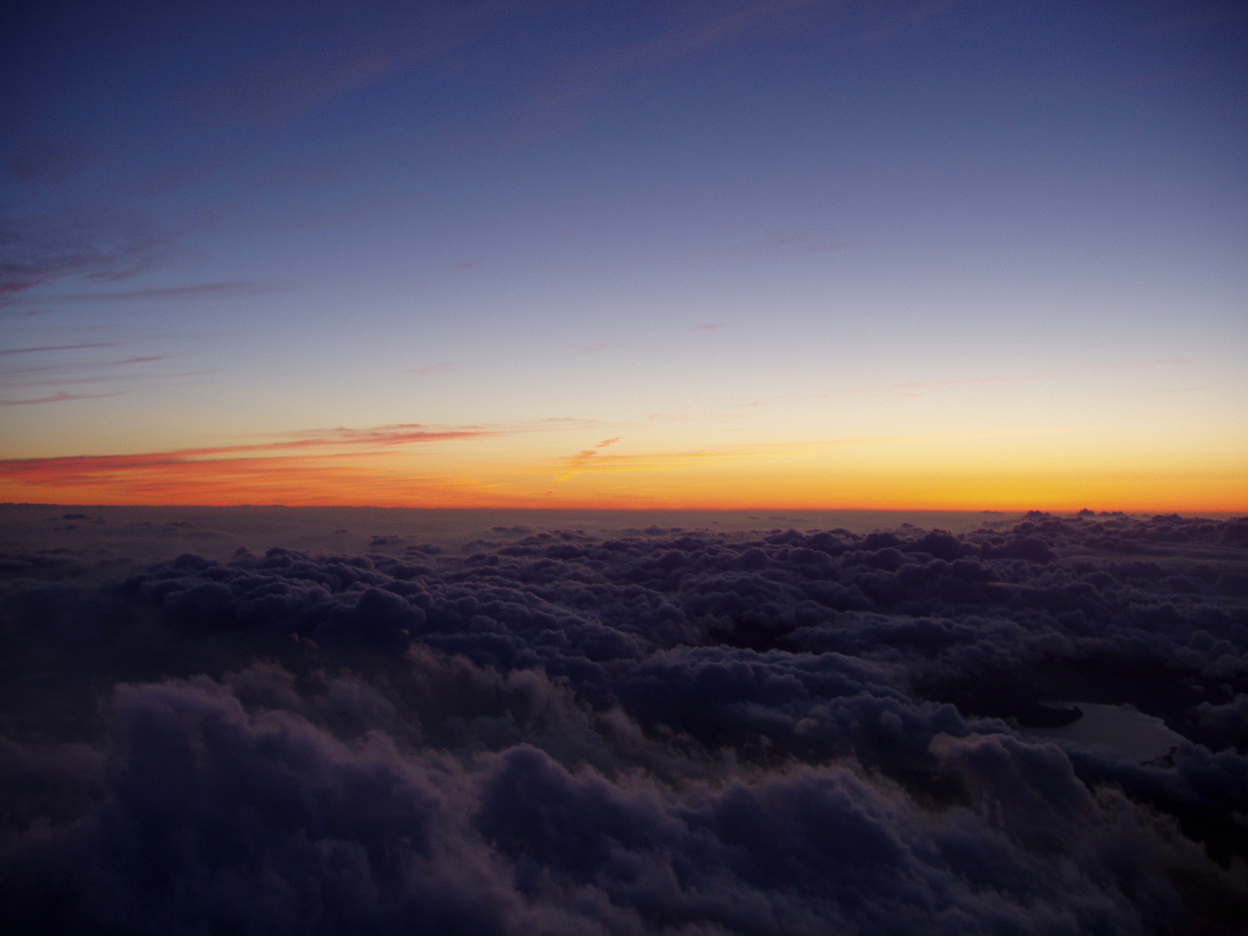 Mount Fuji Ascent: Sunrise at summit - © Jim Holland