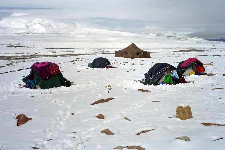 Shishapangma Base Camp: Base Camp after a nights snow - © flickr user- Brigitte Djajasasmita...
