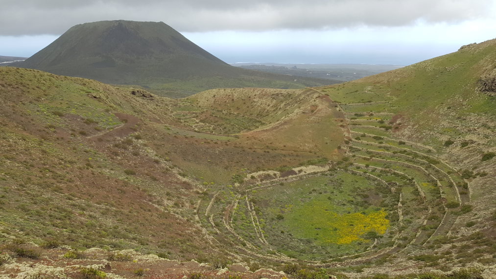 Spain Canary Islands: Lanzarote, Lanzarote, Los Helechos craters, Corona behind, Walkopedia