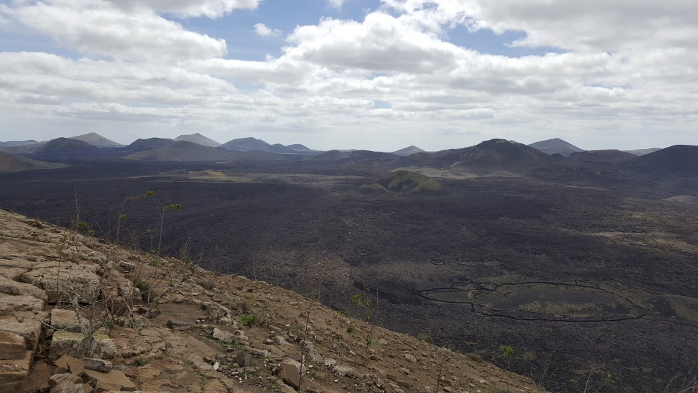 Spain Canary Islands: Lanzarote, Caldera Blanca , 2018 Towards Timanfaya from caldera rim, Walkopedia