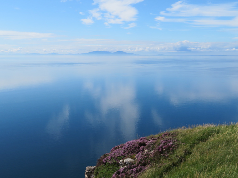 United Kingdom Scotland Isles Skye, NW Capes and Cliffs, Outer Hebrides from Ramasaig Cliff, stillest sea ever, Walkopedia