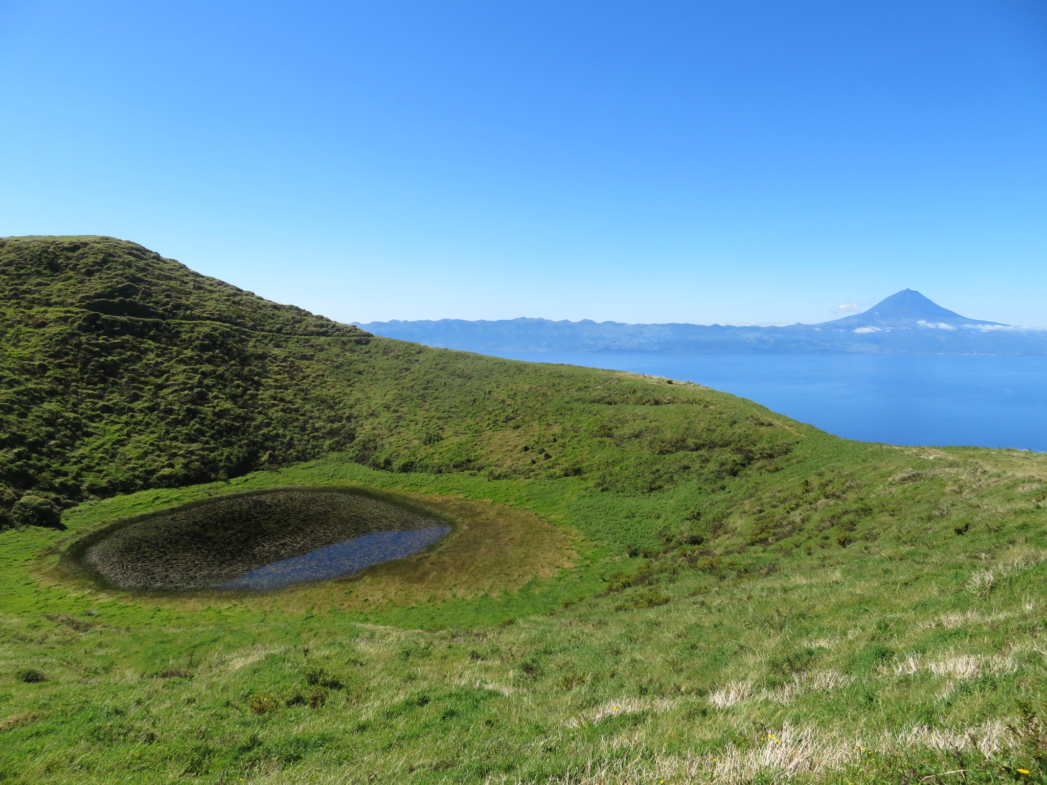 Portugal Azores Sao Jorge, The Central Ridge, Pico da Esperanca crater tarn, Pico volcano behind, Walkopedia