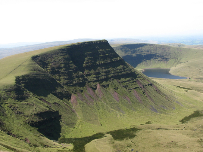 United Kingdom Wales Brecon Beacons, The Black Mountain, Lake coming into view behind Picws du, Walkopedia