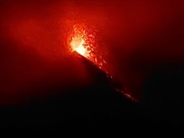 Guatemala, Volcan Acatenango and Volcan Fuego, Fuego erupting, through mist, Walkopedia