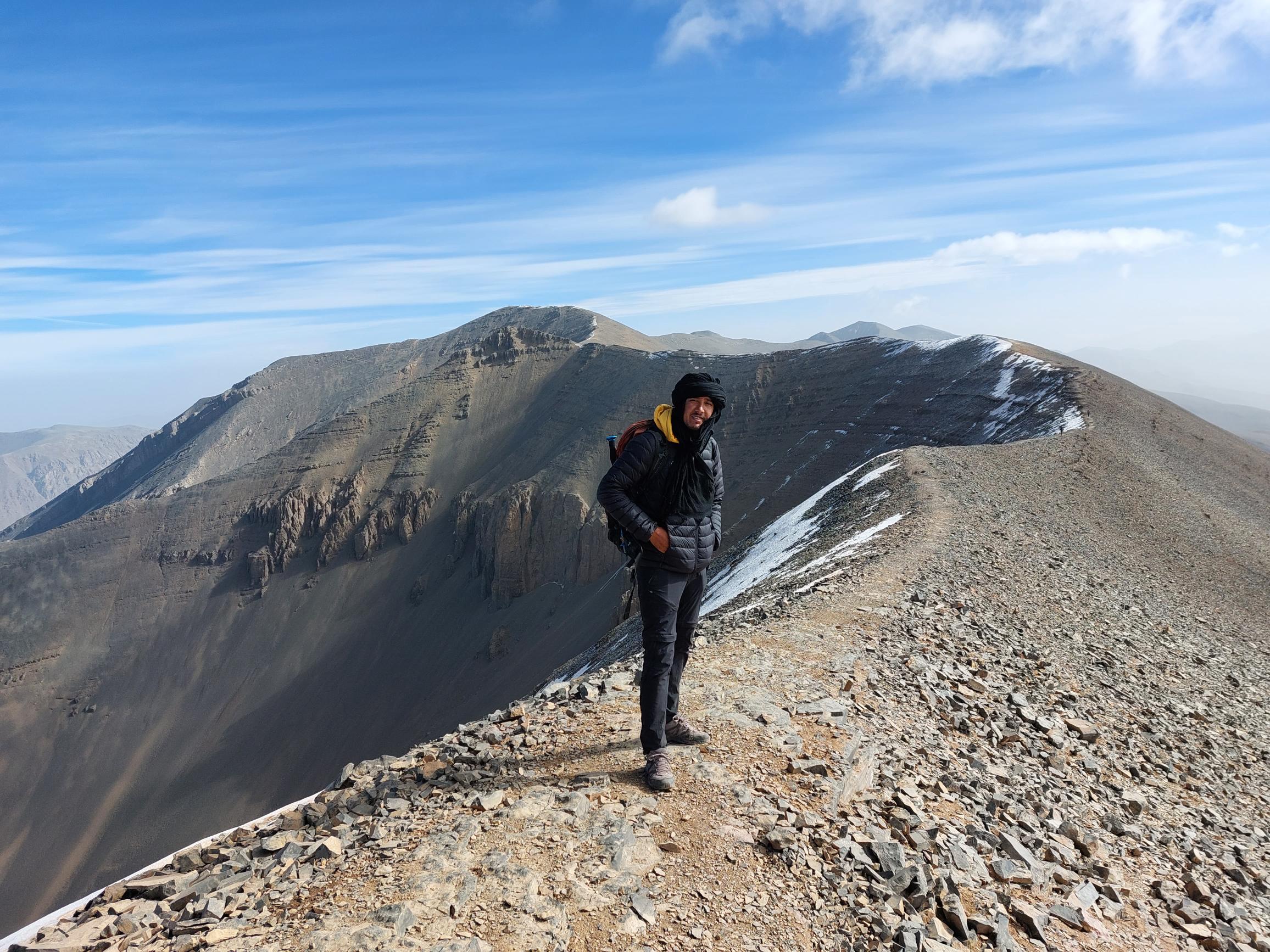 Morocco High Atlas MGoun, MGoun Traverses and Circuits, Day 3,7 Our guide on amazing high M'goun ridge, Walkopedia