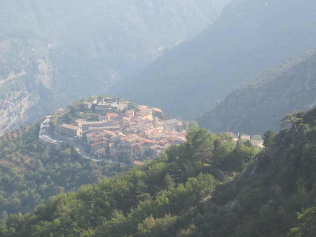 France Alps Mt Blanc Area, Tour of Mt Blanc , First sight of Utelle, perched above the Vesubie Valley, Walkopedia