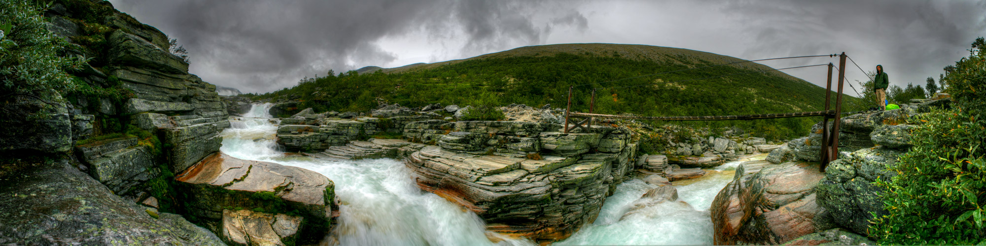The waterfall of the Langglupbekken with suspension bridge - © Freder Rondane National Park: The waterfall of the Langglupbekken with suspension bridge - © Freder