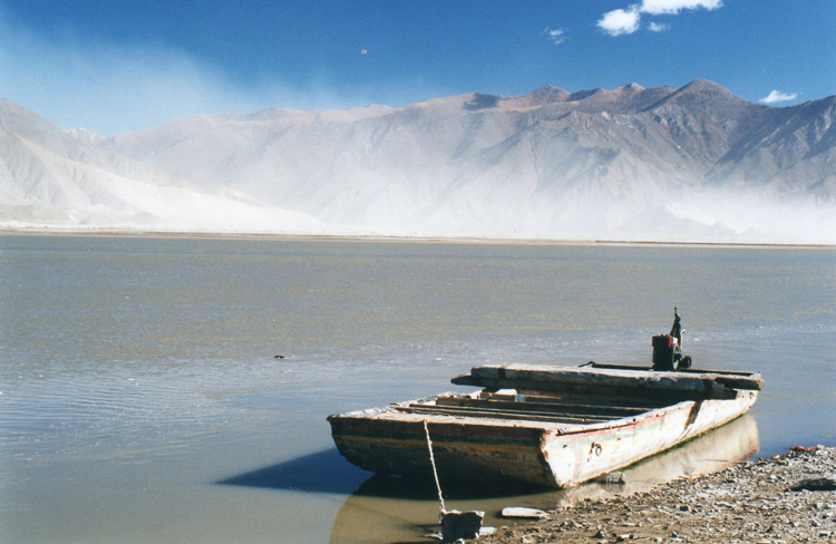 China Tibet, Tibet's Monastery Koras, Ferry to Samye, dust behind, Walkopedia