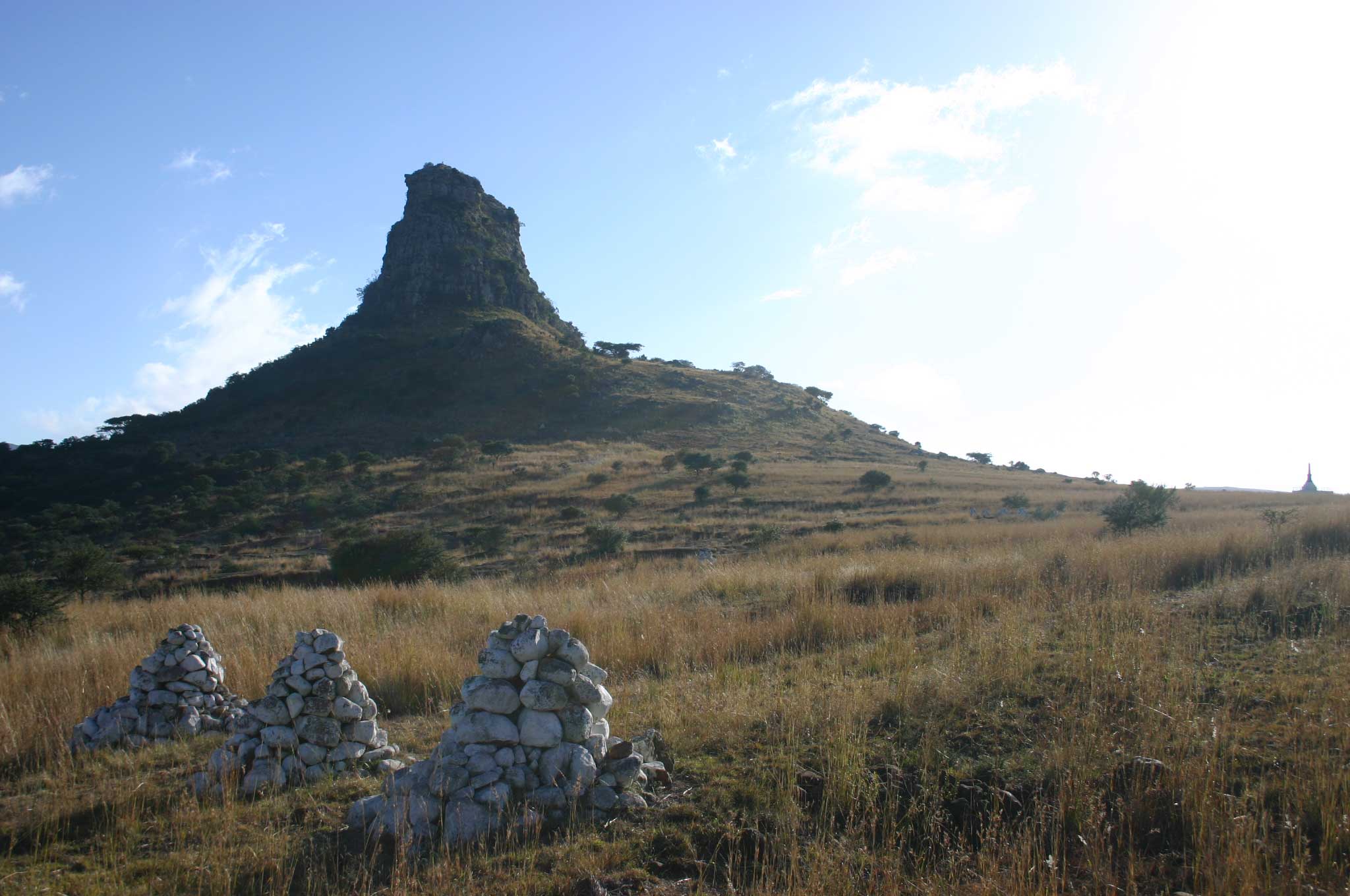 The Fugitives' Trail, Isandlwana to the Buffalo River
Isandlwana From behind the saddle - © William Mackesy The Fugitives' Trail, Isandlwana to the Buffalo River
Isandlwana From behind the saddle - © William Mackesy