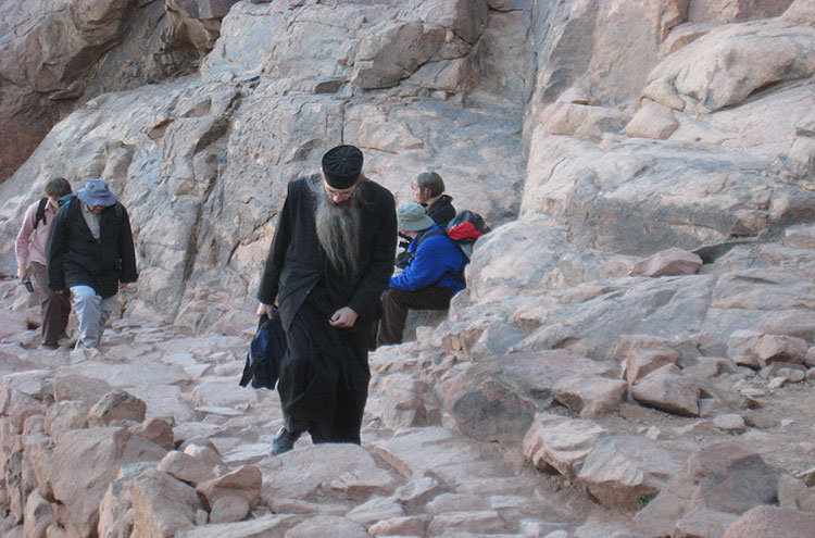 A priest walking up Mount Sinai - © From Flickr user Gloria-Euyoque Mount Sinai: A priest walking up Mount Sinai - © From Flickr user Gloria-Euyoque